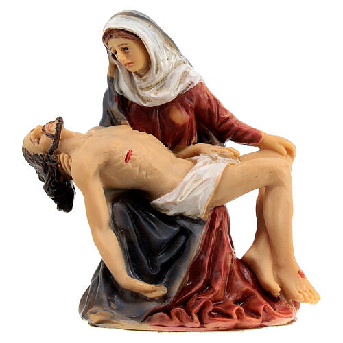 figurka jezusa z krzyza zdjetego w ramionach maryi